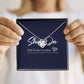 A lady 's hands hold luxury box, necklace on the message card