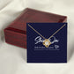 Knot necklace on message card with wooden box